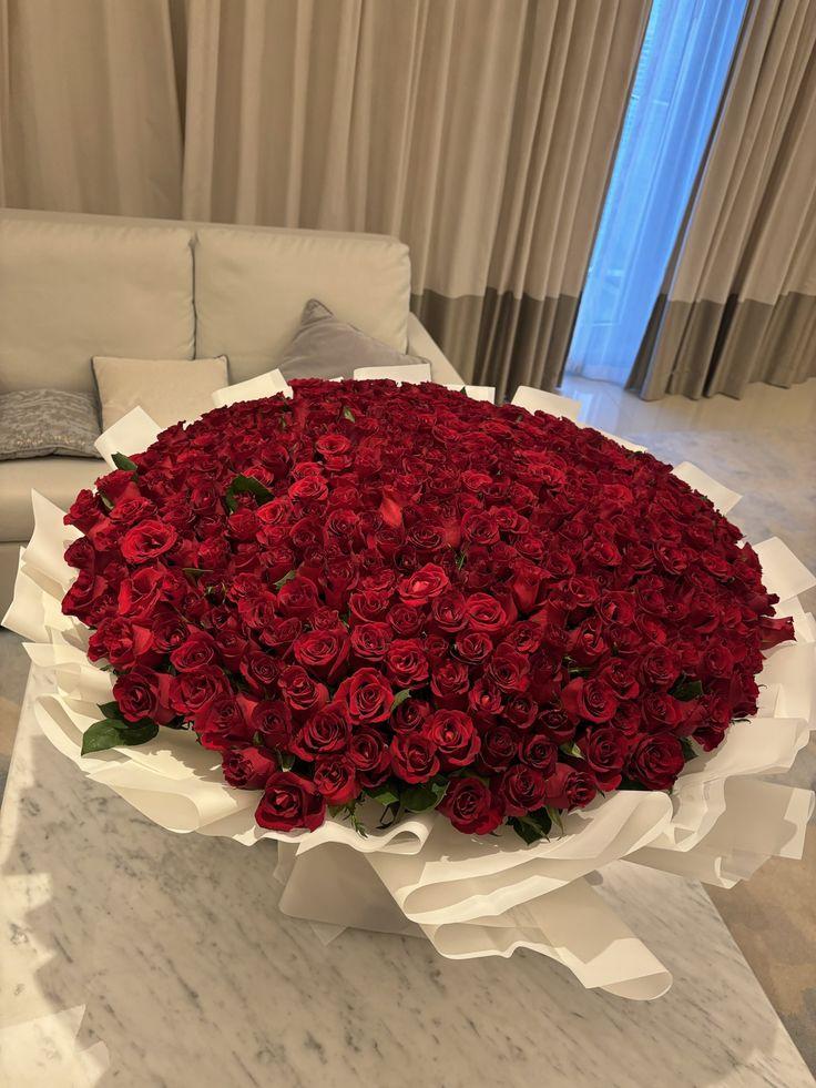 Corporate meeting room with carefully timed floral arrangements that maintain elegance throughout business hours